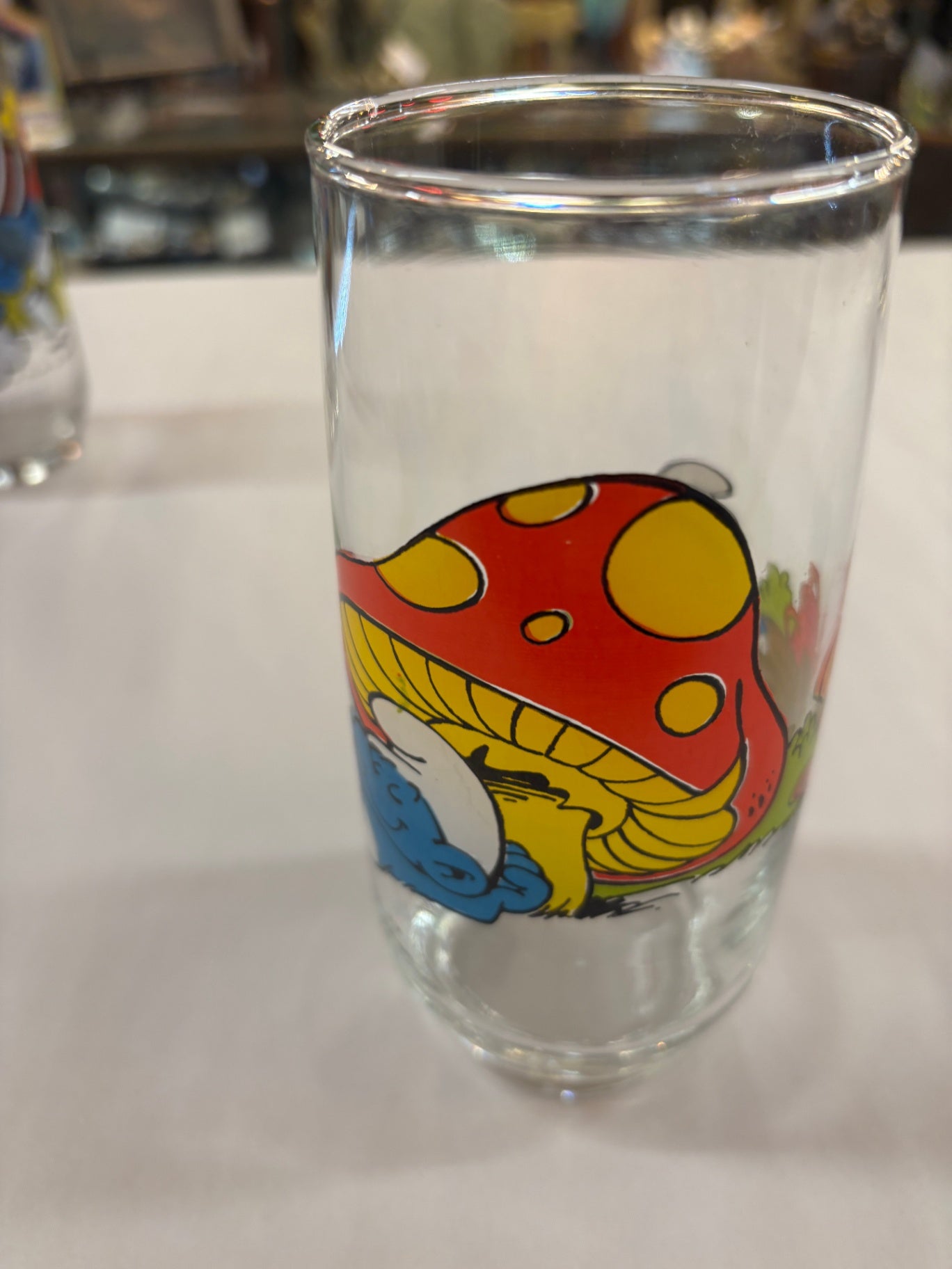 Smurf Lazy drinking glass 1982 Peyo Lic by Wallace Berry and Company