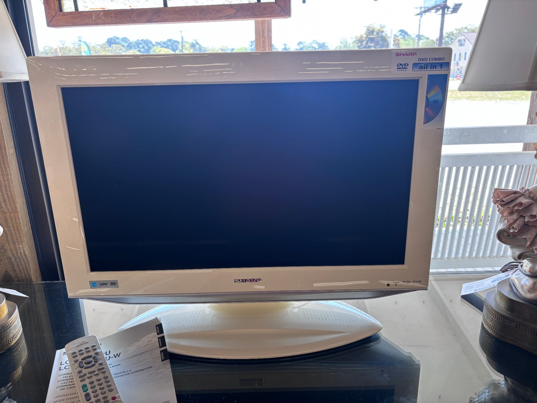  Sharp AQUOS LCD television with a built-in DVD player
