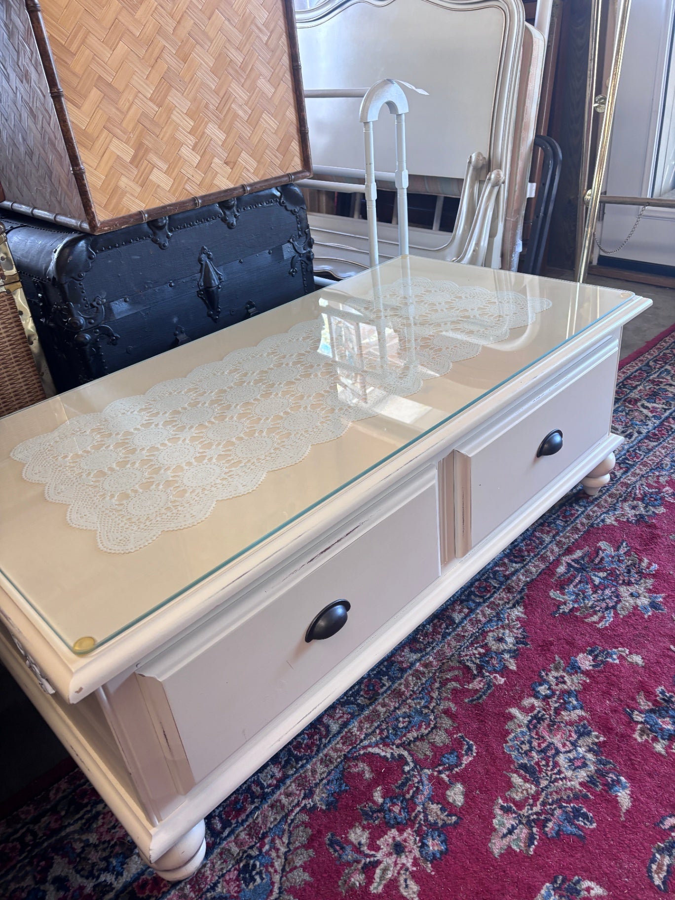 White wood coffee table with glass top