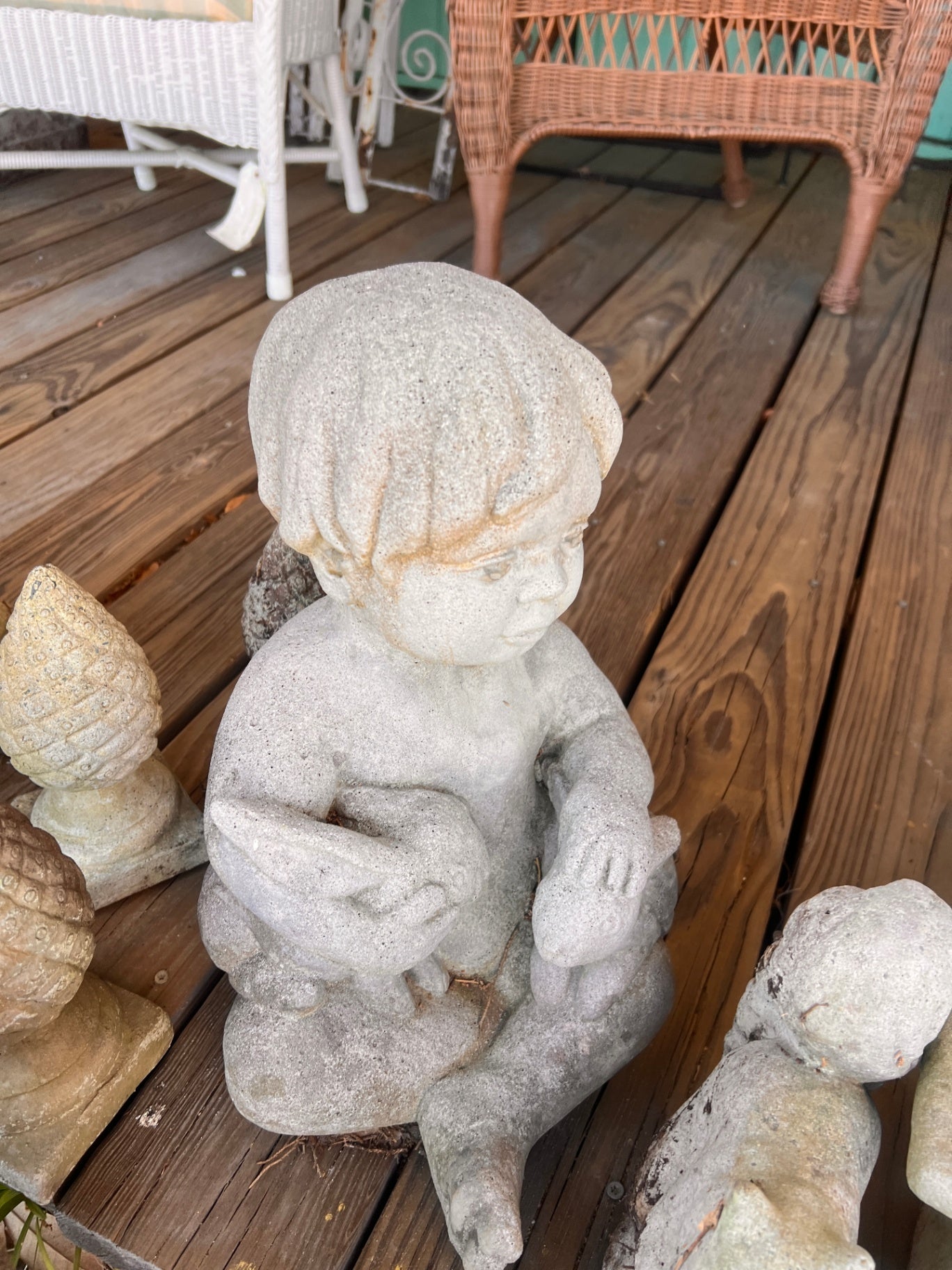Concrete Boy Holding Rabbit Statue