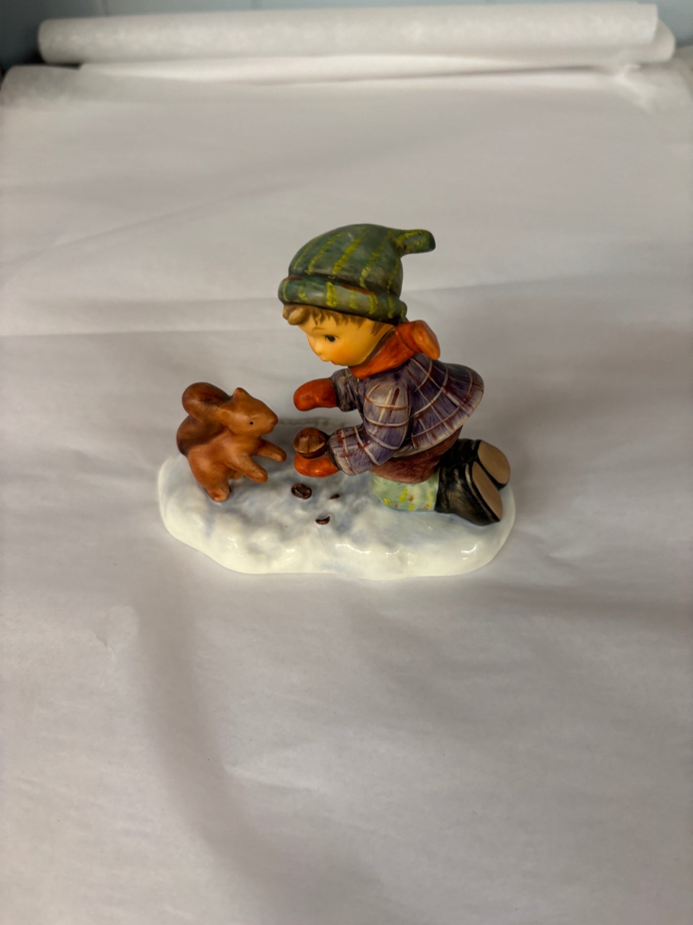 Vintage Porcelain Winter Child Feeding Squirrel Figurine Snow Scene Collectible