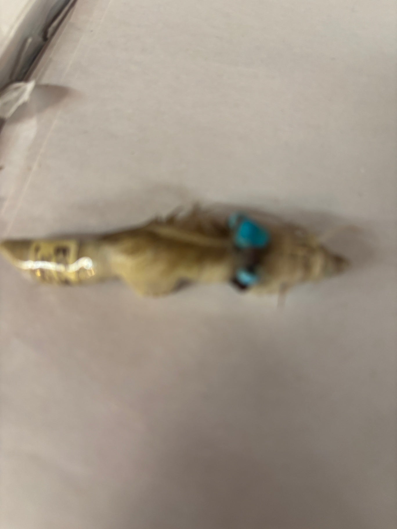 Native American-style feather hat pin