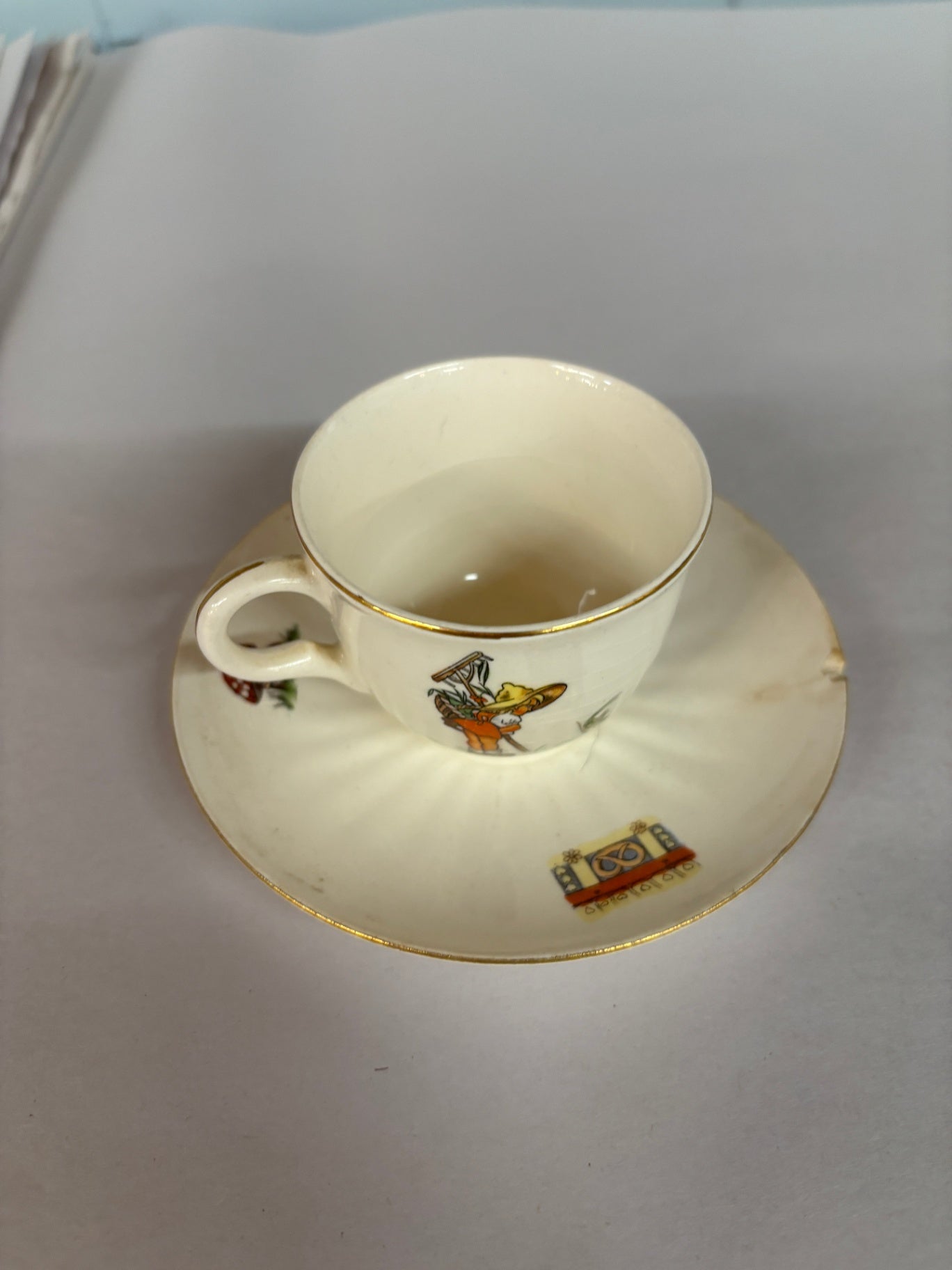 Vintage Child’s Porcelain Tea Cup & Saucer Set with Nursery Rhyme Motif