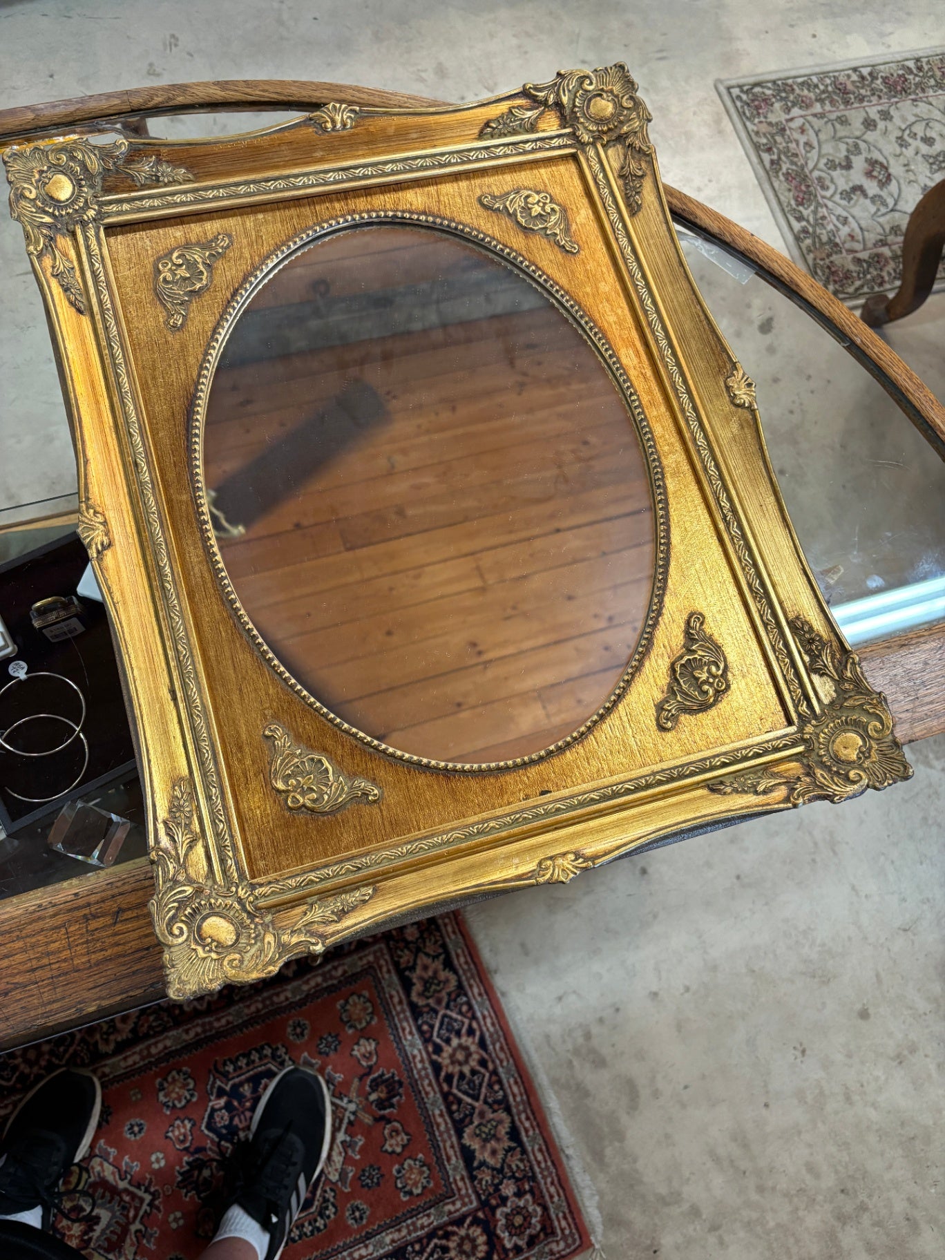 Vintage Hollywood Regency Gold Gilt Oval Wall Mirror in Ornate Frame