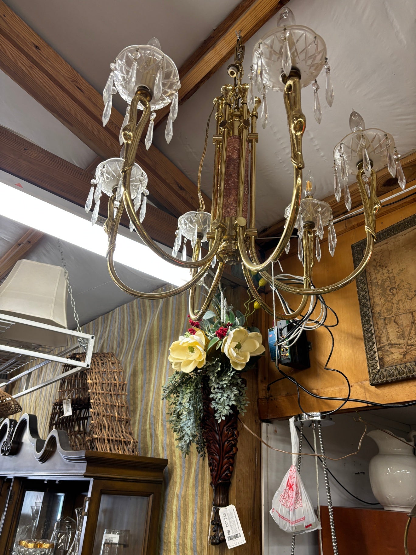 This is likely a 1970s brass swan and marble chandelier fixture featuring hanging crystal prisms