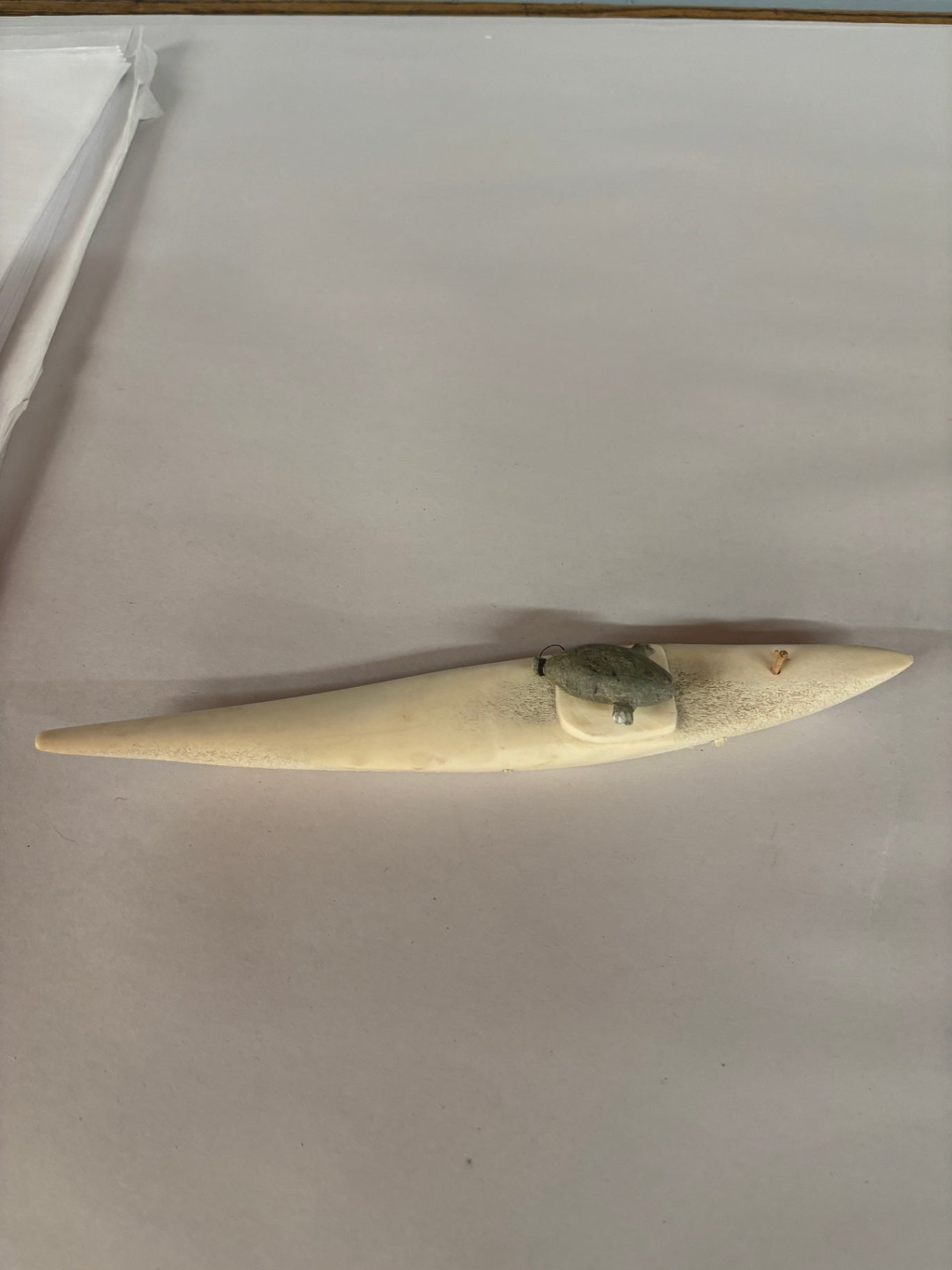 Vintage Inuit-Style Carved Bone or Antler Kayak with Soapstone Seal Figurine