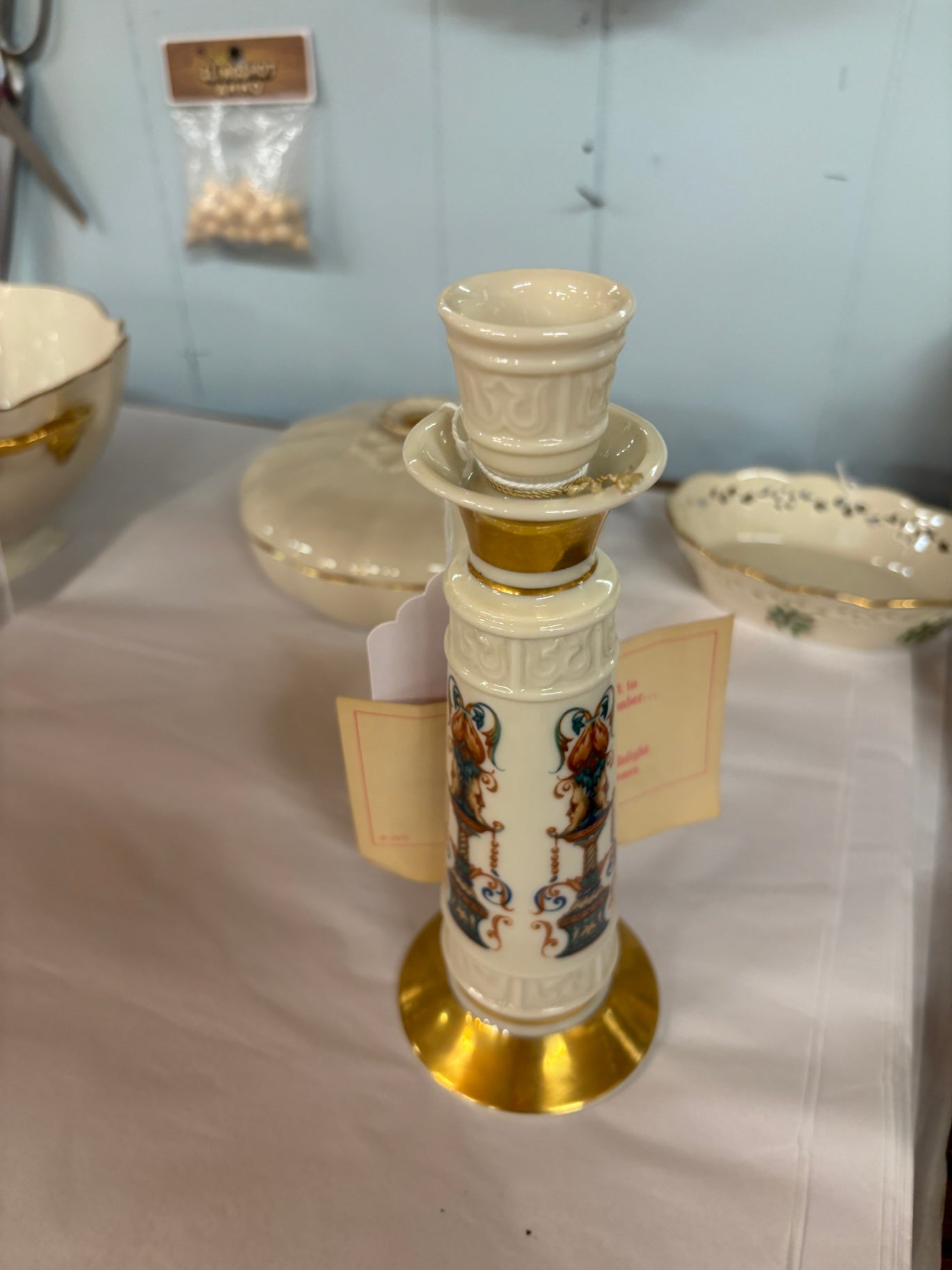 ivory porcelain candlestick is a vintage Lenox Lido model featuring hand-decorated 24K gold trim