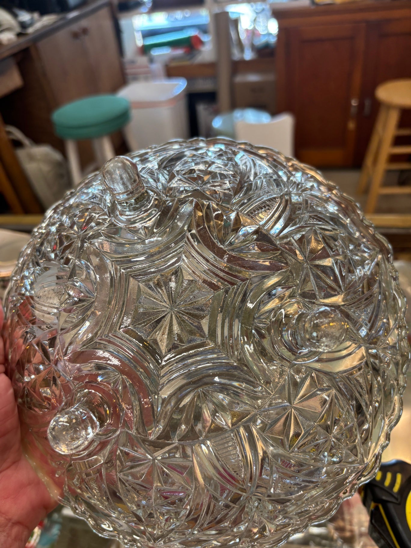 Vintage crystal glass serving bowl featuring a three-toed design