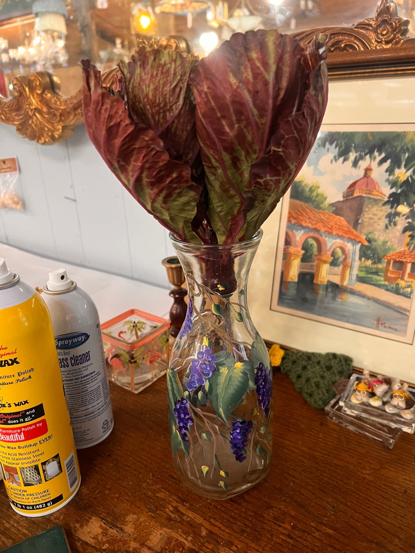hand-painted glass vase decorated with purple grapes, green leaves, and gold vines