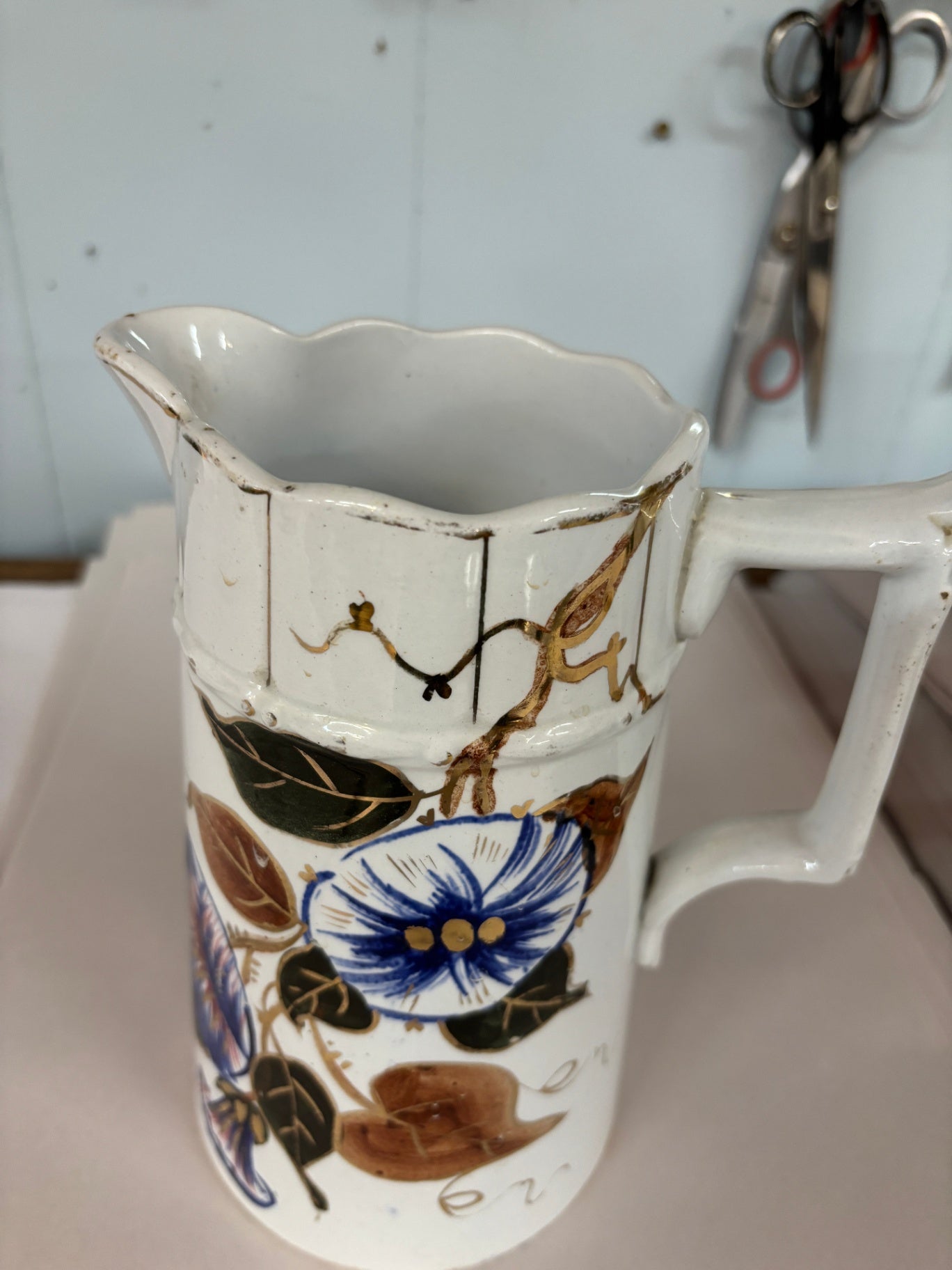 Antique Hand-Painted Floral Porcelain Pitcher with Scalloped Rim & Gilt Decoration