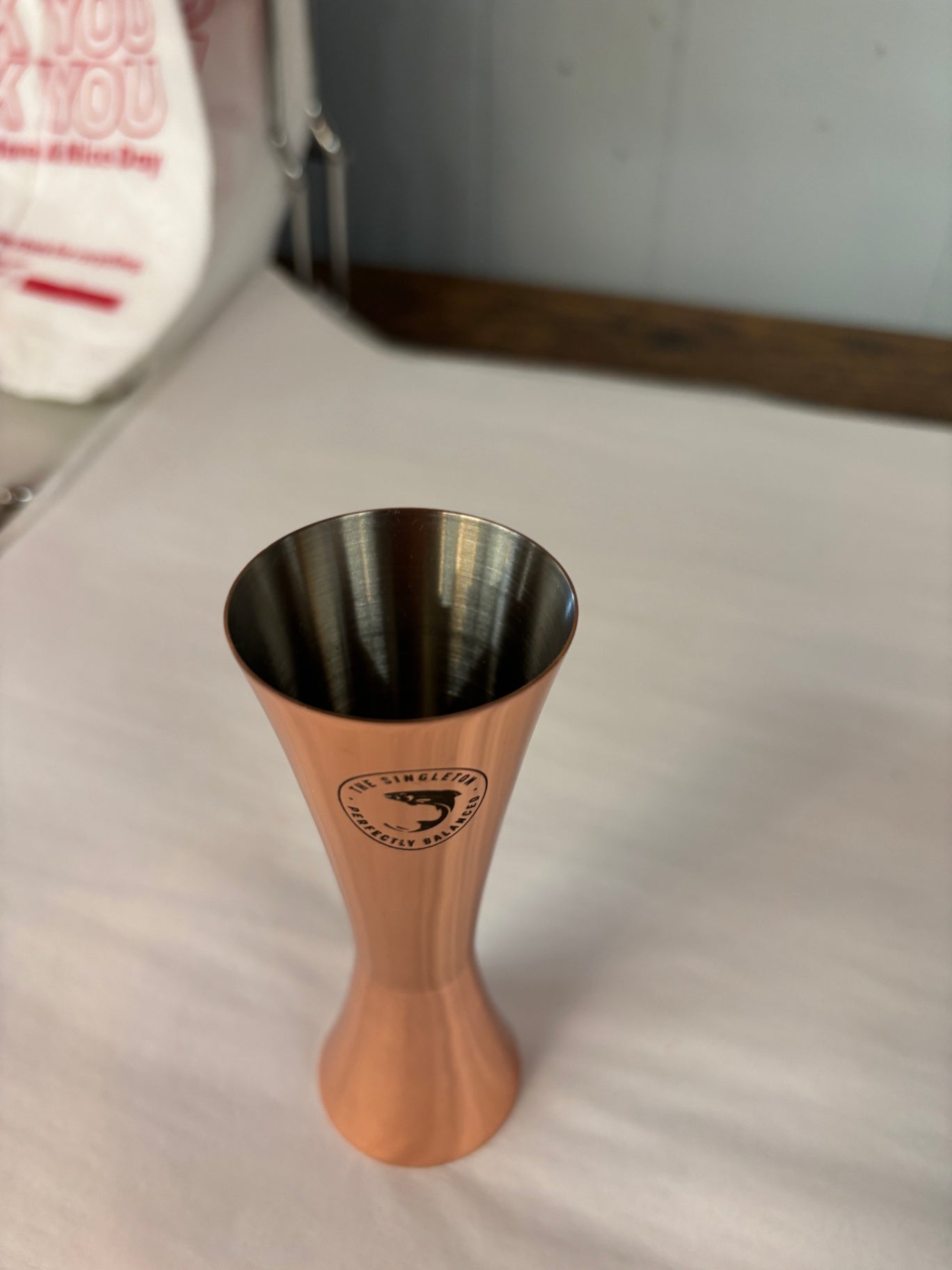 The Singleton "Perfectly Balanced" promotional cocktail jigger