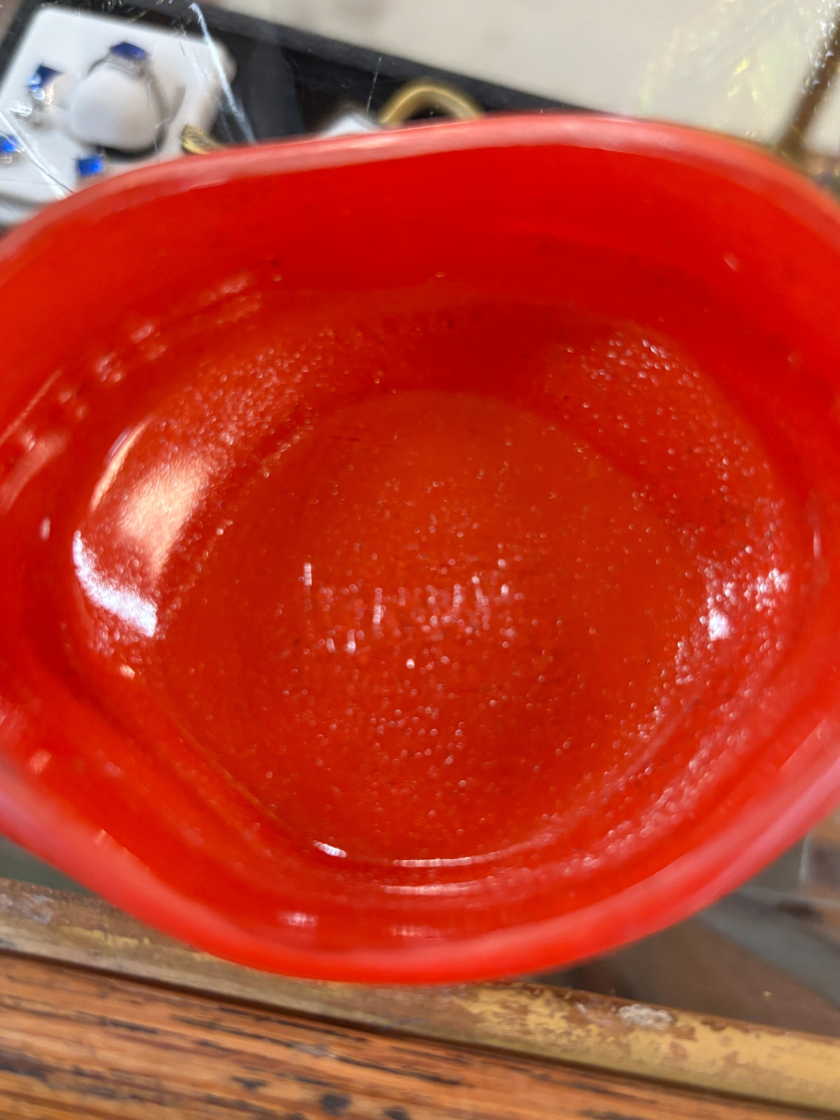 McKee Glasbake vintage red glass deviled crab baking dish, likely a mid-century piece from the line styled in the shape of a shell