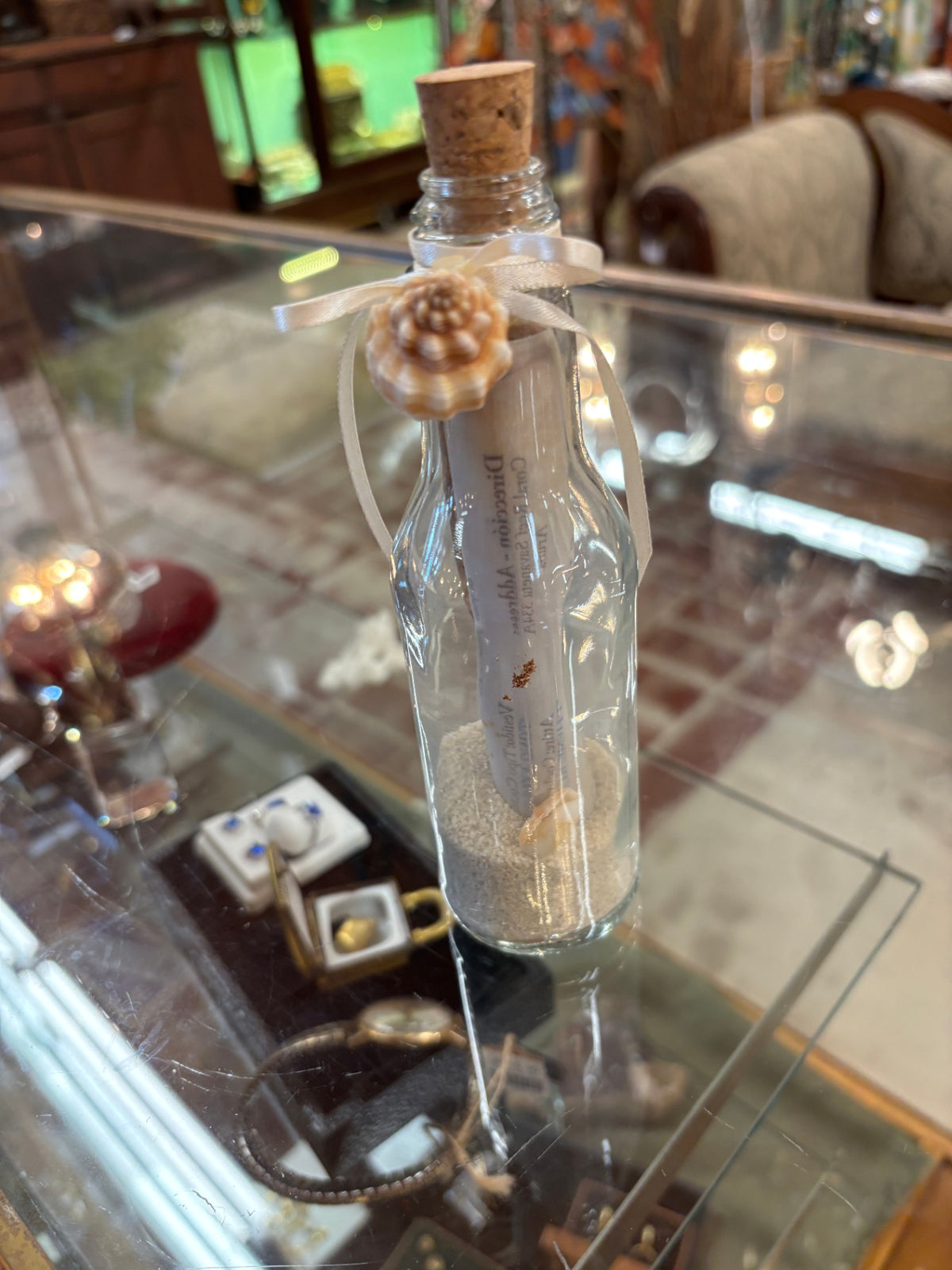 Decorative coastal-style message in a bottle
