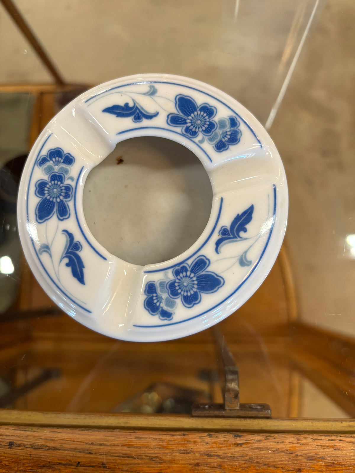 Vintage Chinese white porcelain ashtray decorated with a classic blue floral pattern