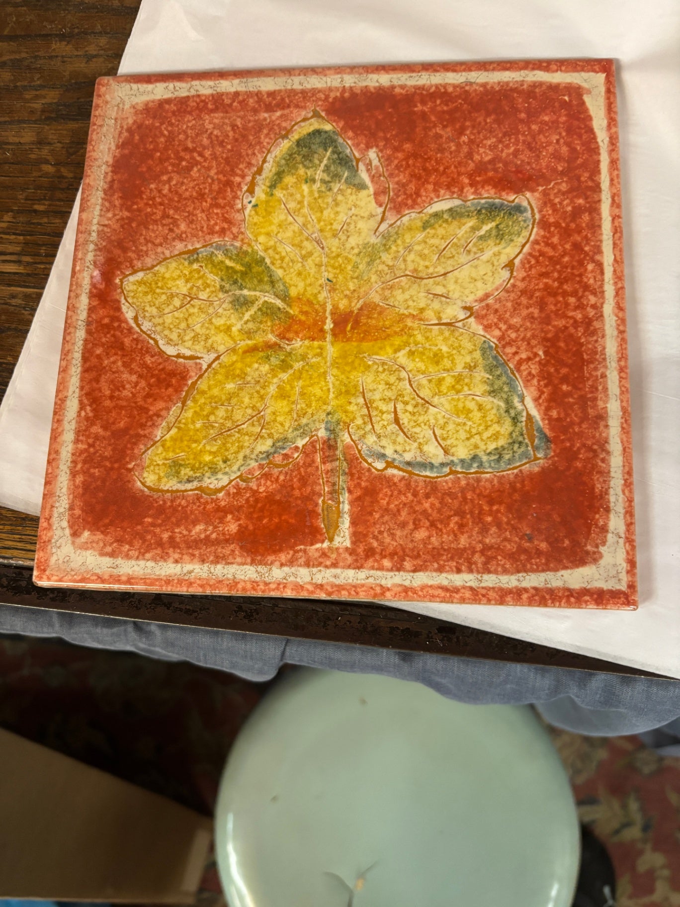 Orange ceramic tile trivet or hot plate made by Vietri in Italy