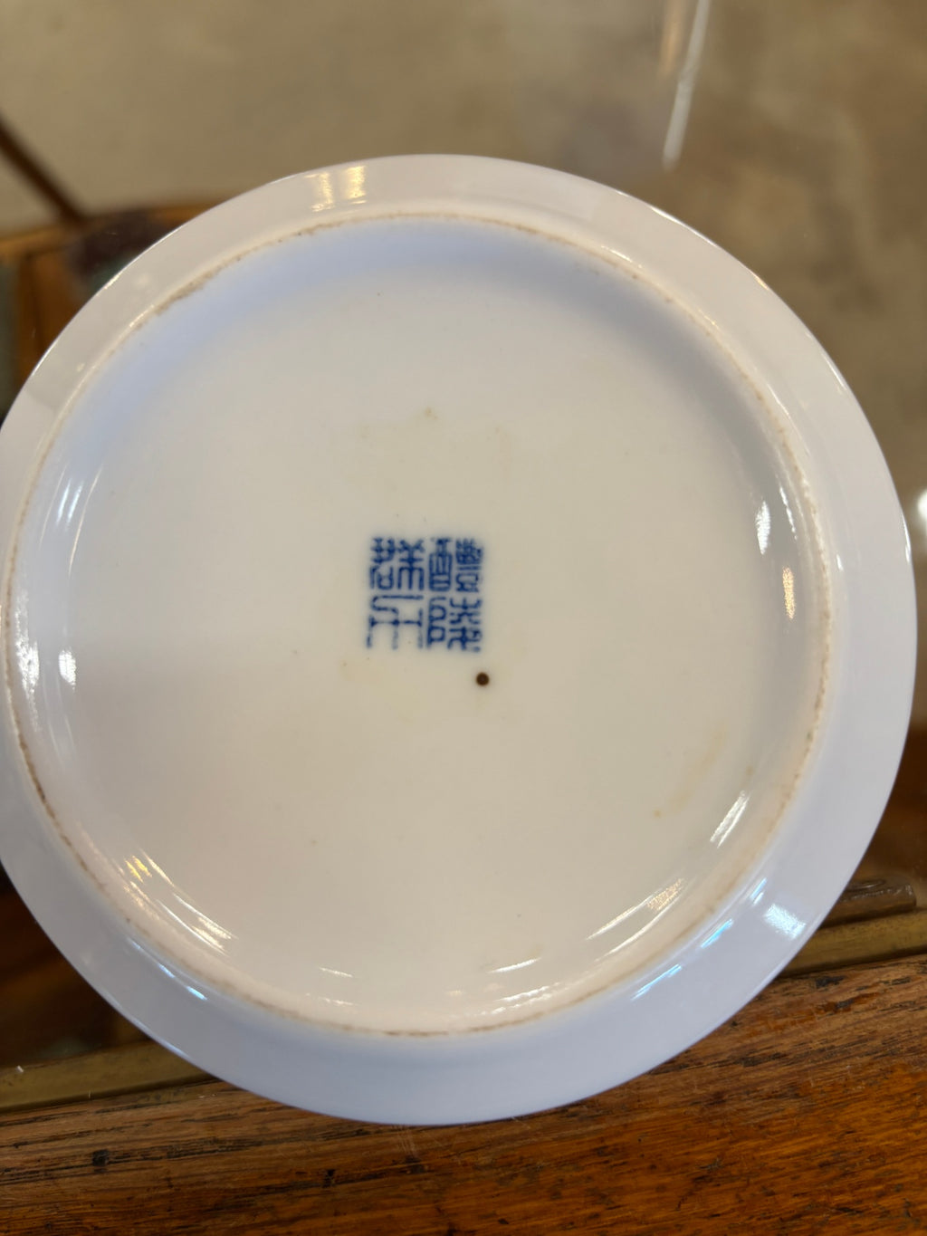 Vintage Chinese white porcelain ashtray decorated with a classic blue floral pattern
