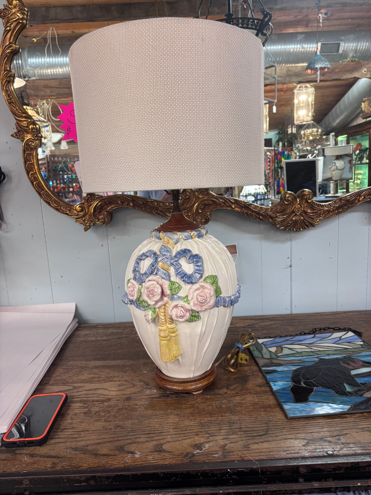 Vintage Italian Capodimonte-style porcelain table lamp featuring hand-painted raised pink rose reliefs, blue ribbon bows, and tassel accents