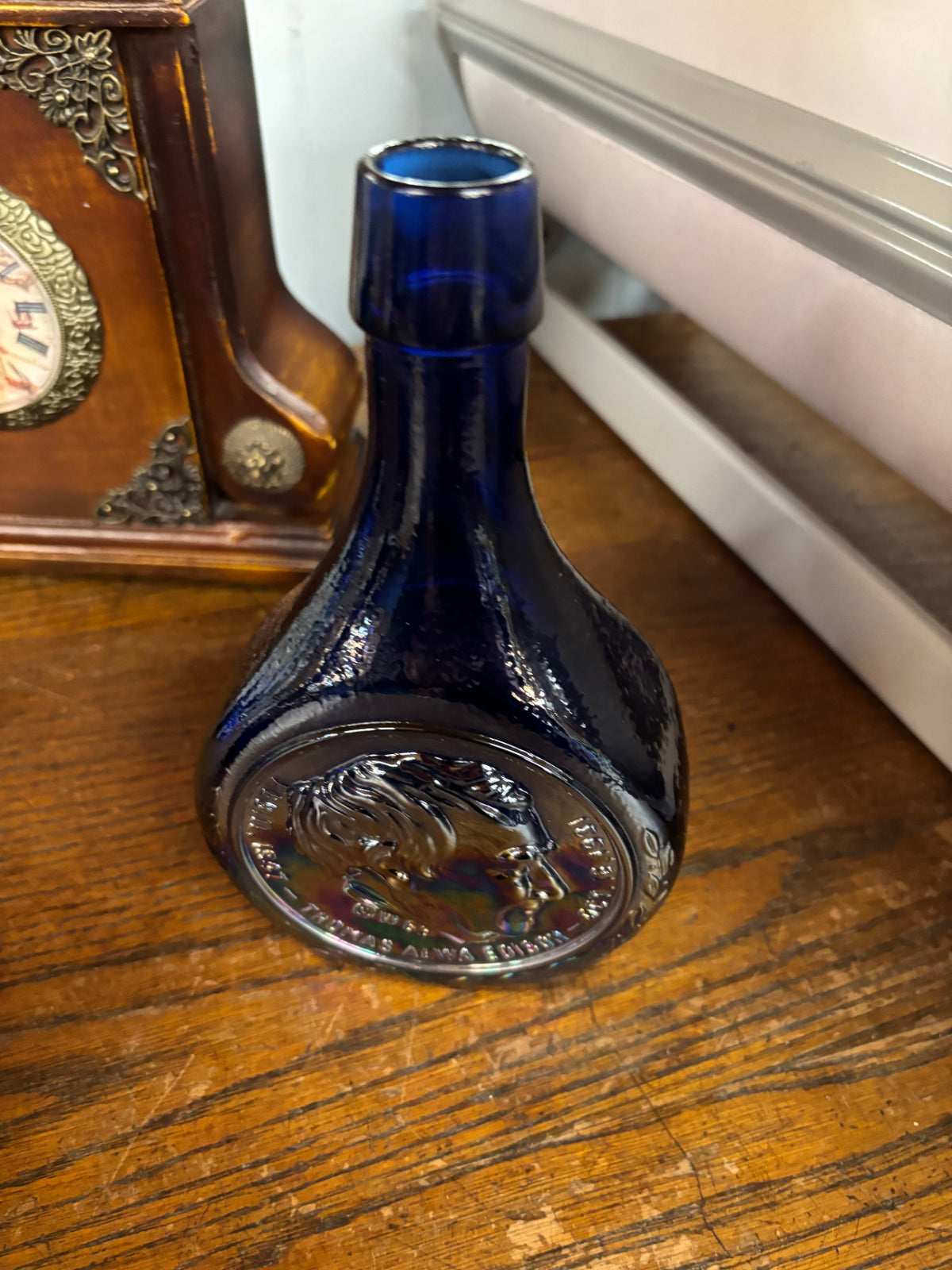 Vintage Cobalt Blue Glass Commemorative Bottle with Embossed Portrait Medallion