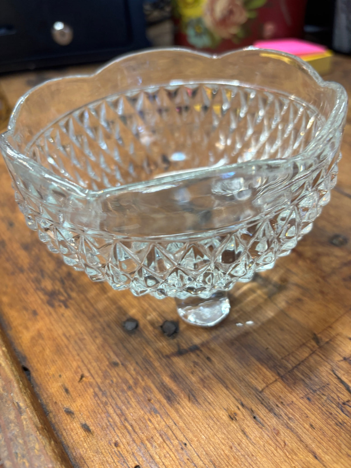 Three-footed clear glass candy dish or bon-bon bowl