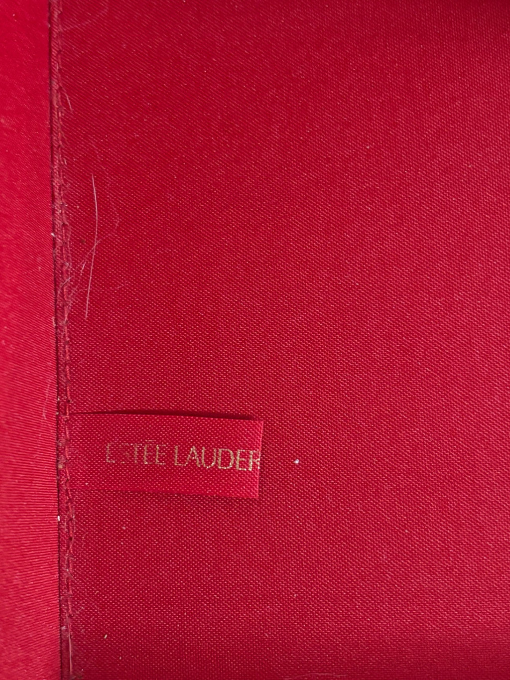  Estée Lauder gold faux leather makeup train case