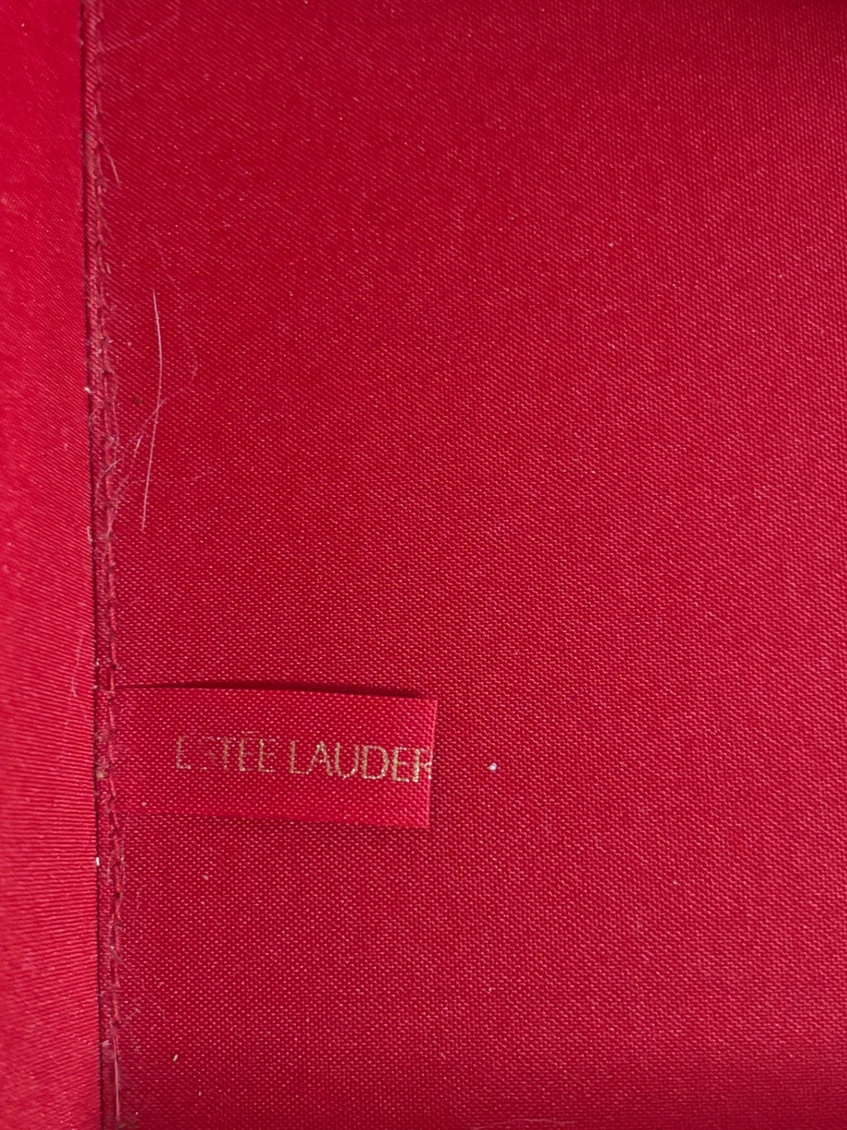  Estée Lauder gold faux leather makeup train case