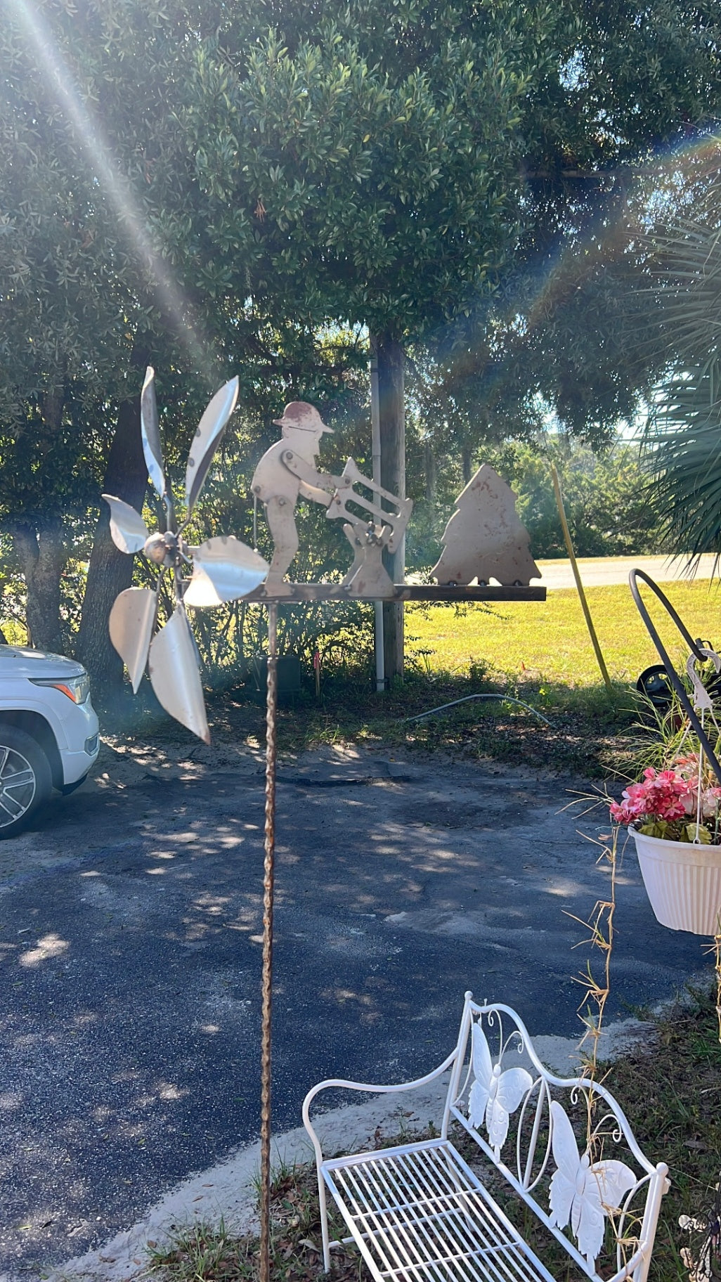 Vintage-Style Folk Art Metal Whirligig – Man Sawing Log Wind Spinner Yard Ornament