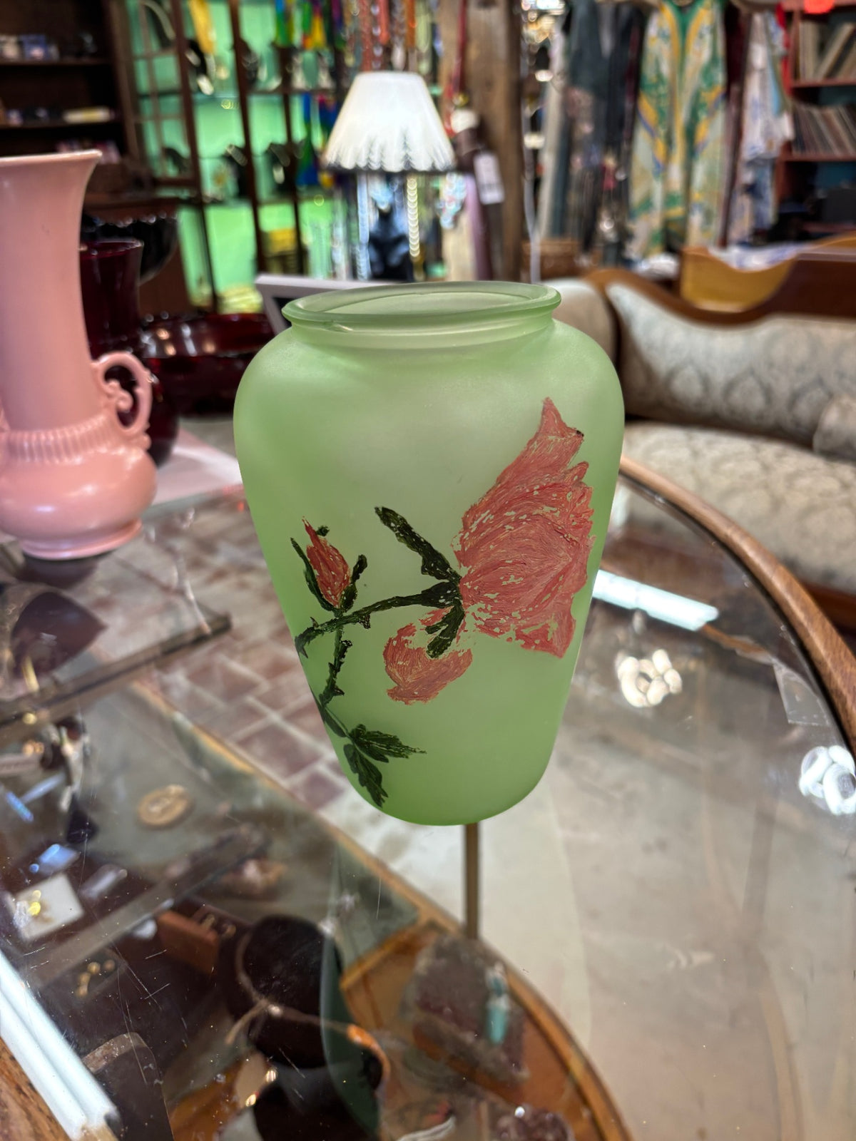 Vintage frosted green art glass vase featuring hand-painted enameled pink floral and stem motifs