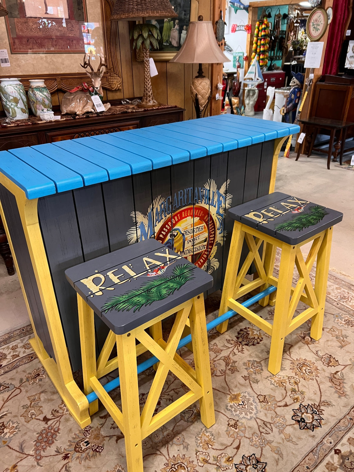 Margaritaville Jimmy Buffett Tropical Wooden Tiki Bar with 4 Matching RELAX Stools – 5-Piece Coastal Bar Set