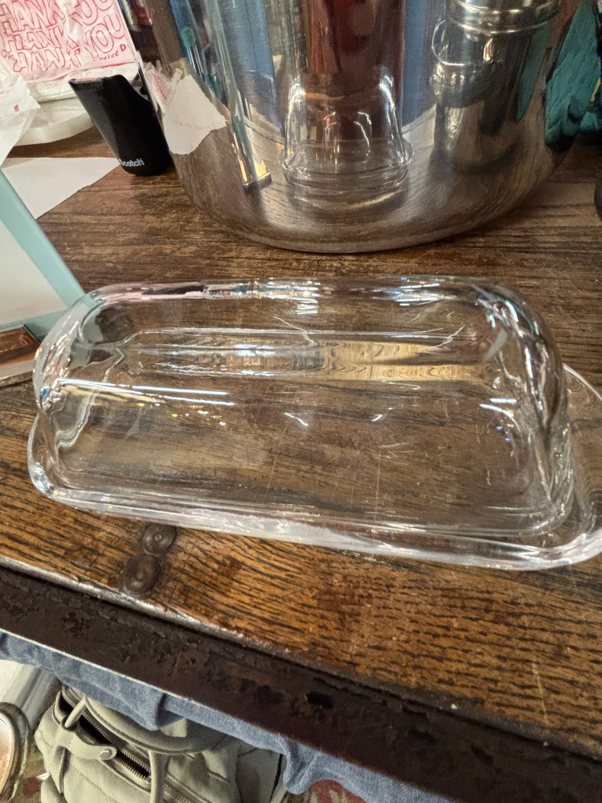 Clear glass butter dish with a matching domed lid