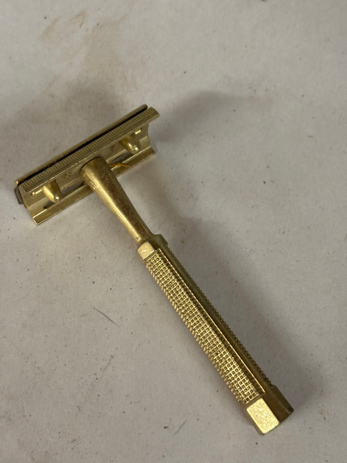 Vintage Gold-Tone Metal Safety Razor with Textured Grip Handle