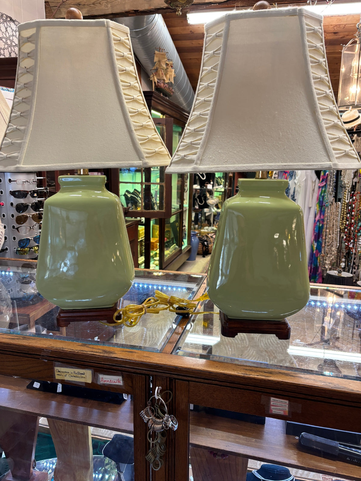 Pair of Celadon Green Glazed Ceramic Table Lamps with Cream Fabric Shades