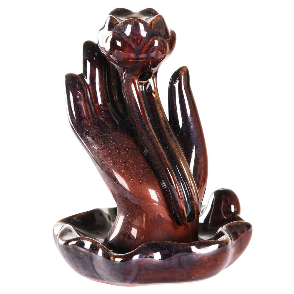 HAND WITH LOTUS BACKFLOW CONE BURNER