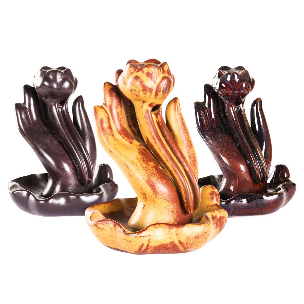 HAND WITH LOTUS BACKFLOW CONE BURNER